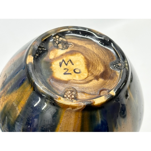 424 - A Late 19th/Early 20th Century glazed tobacco jar. Circa 1900. 14x11cm