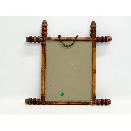 425 - A Late 19th Century Cambridge framed mirror. 34x34cm