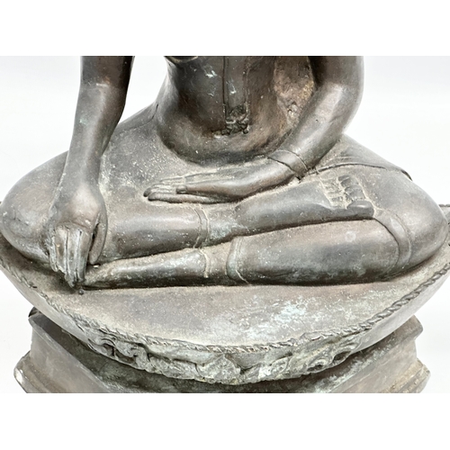 65 - A large 19th Century Thai bronze Gautama Buddha statue. 31x15x39cm