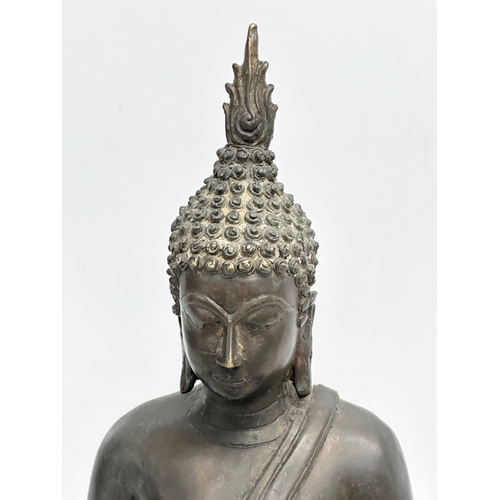 65 - A large 19th Century Thai bronze Gautama Buddha statue. 31x15x39cm