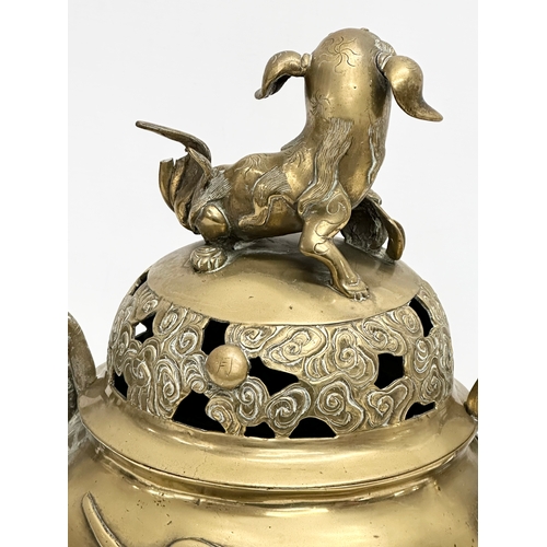 66 - A large 19th Century Chinese, Xuande Revival brass tripod incense burner. Xuande mark. 31x25x34cm