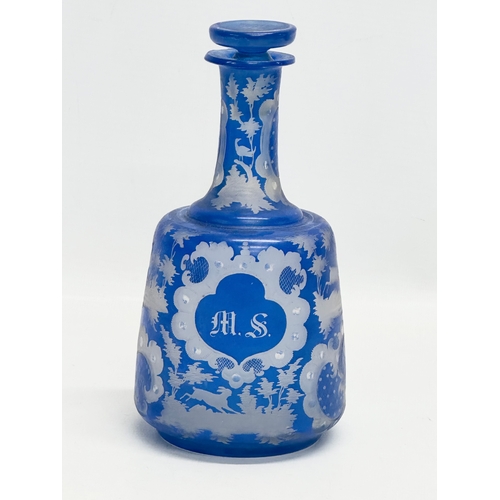 440 - A Late 19th Century Bohemian blue overlay glass decanter. Inscribed M.S. 20cm