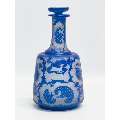 440 - A Late 19th Century Bohemian blue overlay glass decanter. Inscribed M.S. 20cm