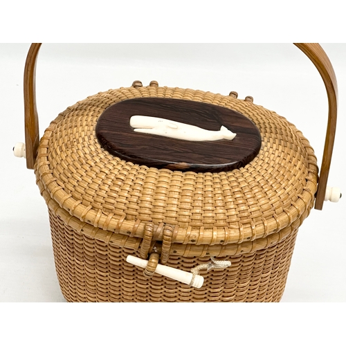 2 - Stanley M Roop Nantucket. A 1970’s wicker friendship basket. Nantucket. With whale bone and rosewood... 