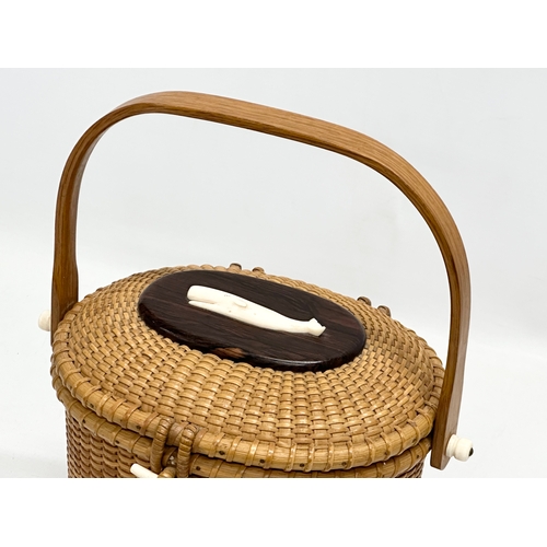 2 - Stanley M Roop Nantucket. A 1970’s wicker friendship basket. Nantucket. With whale bone and rosewood... 