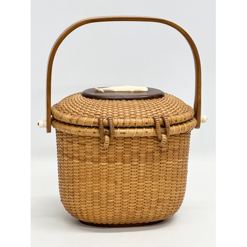 2 - Stanley M Roop Nantucket. A 1970’s wicker friendship basket. Nantucket. With whale bone and rosewood... 