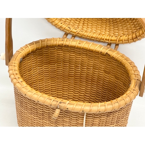 2 - Stanley M Roop Nantucket. A 1970’s wicker friendship basket. Nantucket. With whale bone and rosewood... 