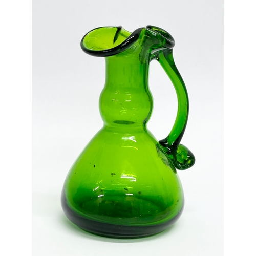 444 - A 20th Century Bristol Green cruet decanter. 13cm