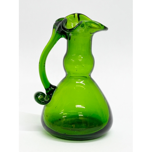 444 - A 20th Century Bristol Green cruet decanter. 13cm