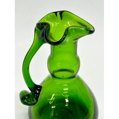 444 - A 20th Century Bristol Green cruet decanter. 13cm