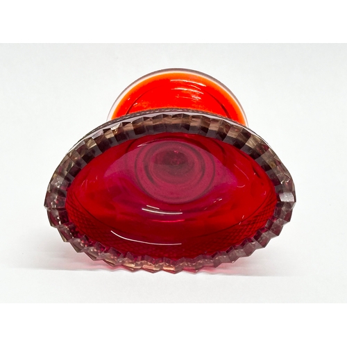 436 - A pair of 19th Century Anglo Irish ruby glass salt cellars. 8.5x6x7cm.