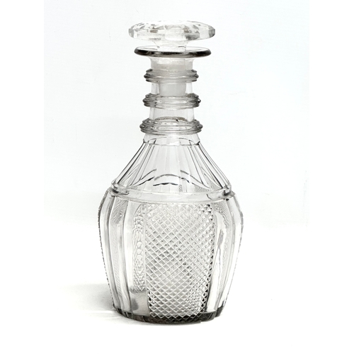 437 - An Early 19th Century George III, 3 ring glass decanter. 24.5cm.