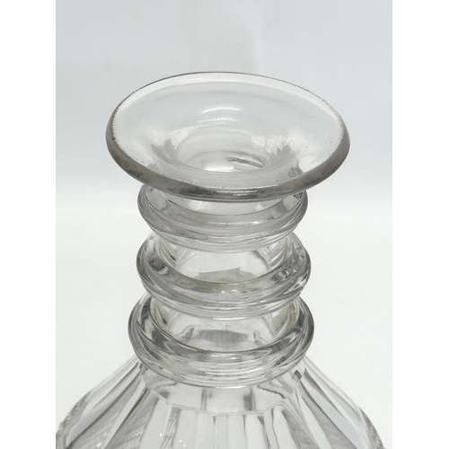 437 - An Early 19th Century George III, 3 ring glass decanter. 24.5cm.