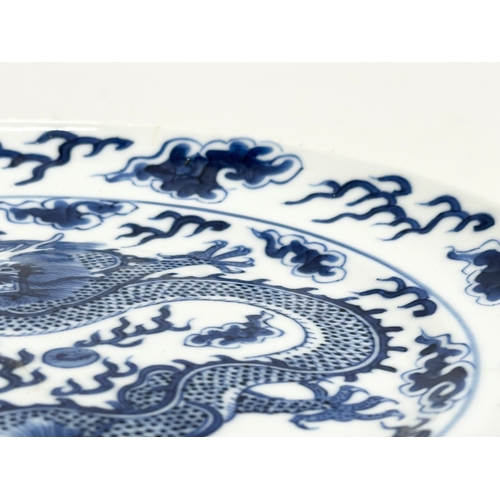 18A - A Chinese, Qing Dynasty five claw dragon and flaming pearl of wisdom plate. Kangxi 6 character mark.... 