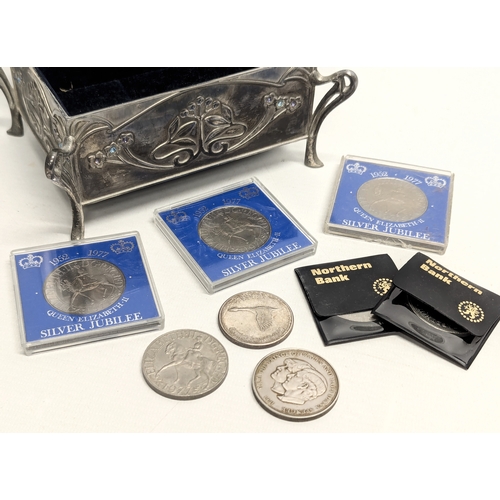 776 - An Art Nouveau jewellery box with a collection of coins including Queen Elizabeth Silver Jubilee.