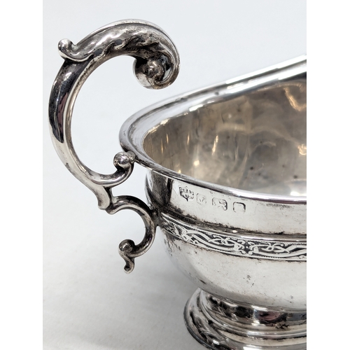 725L - An Early 20th Century silver cream jug by S. Blanckensee & Son Ltd. Birmingham, 1926. 100g. 15x9.5cm