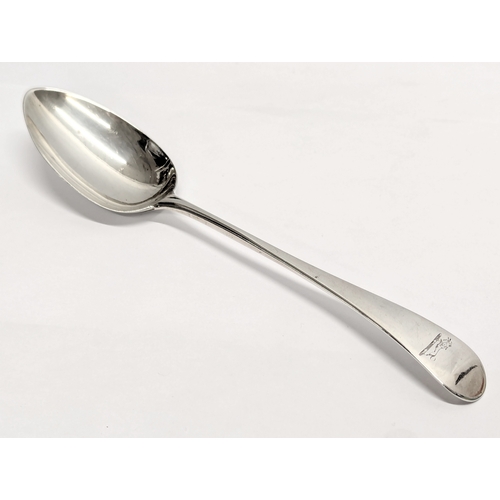 725Q - A Late 18th Century, George III, silver serving spoon. London, 1792. 68g. 23cm