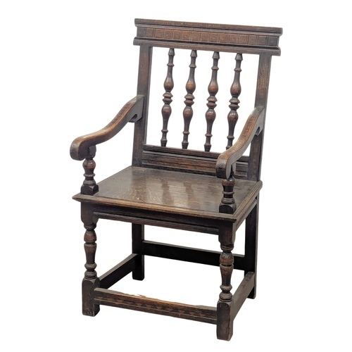 142 - A Late 19th Century oak Wainscot style armchair in the 17th Century style. Circa 1880.