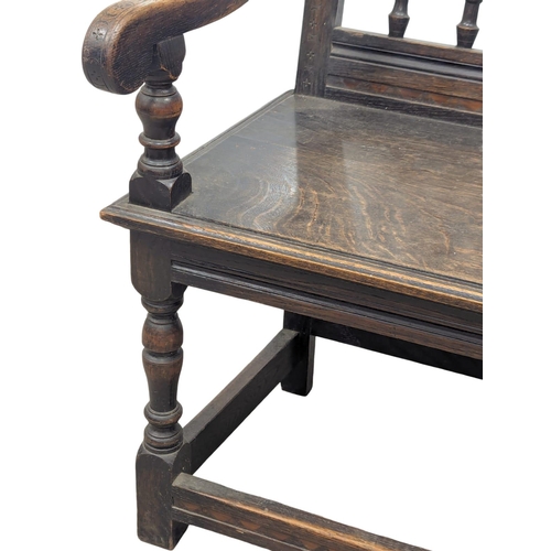 142 - A Late 19th Century oak Wainscot style armchair in the 17th Century style. Circa 1880.