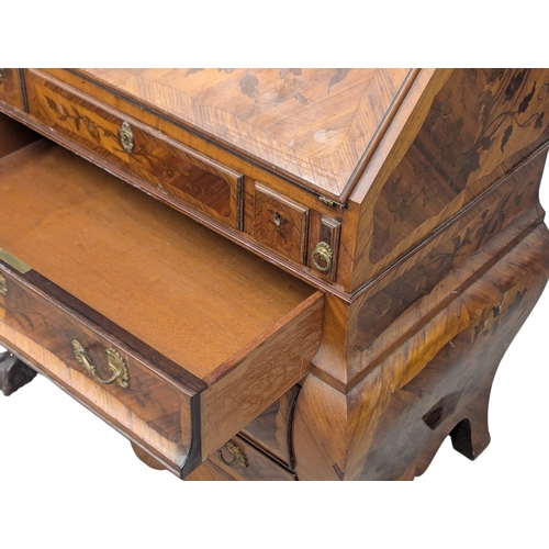 20 - A good quality Early 20th Century Dutch marquetry inlaid Kingwood bombe style writing bureau. With p... 