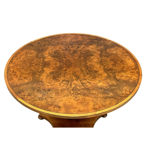 28 - A William IV style burr walnut pedestal centre table/breakfast table. In the manner of David Linley.... 