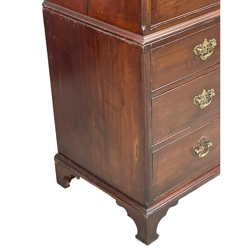 32 - A large Late 18th Century George III mahogany chest on chest, with original brass drop handles and b... 