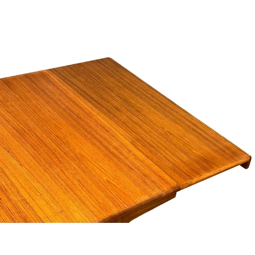 34 - John Herbert for A. Younger. A good quality Late 1960’s Mid Century teak extending  “Sequence” dinin... 