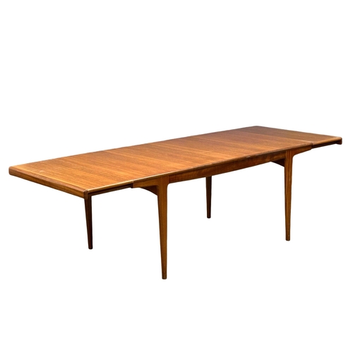 34 - John Herbert for A. Younger. A good quality Late 1960’s Mid Century teak extending  “Sequence” dinin... 