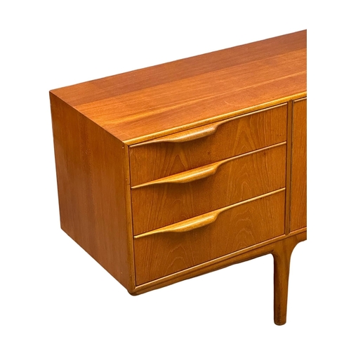 39 - A McIntosh Mid Century teak “Dunvegan” sideboard. Designed by Tom Robertson. 205x46x75cm