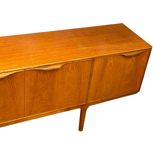 39 - A McIntosh Mid Century teak “Dunvegan” sideboard. Designed by Tom Robertson. 205x46x75cm