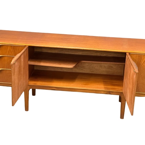 39 - A McIntosh Mid Century teak “Dunvegan” sideboard. Designed by Tom Robertson. 205x46x75cm