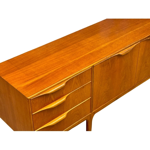 39 - A McIntosh Mid Century teak “Dunvegan” sideboard. Designed by Tom Robertson. 205x46x75cm