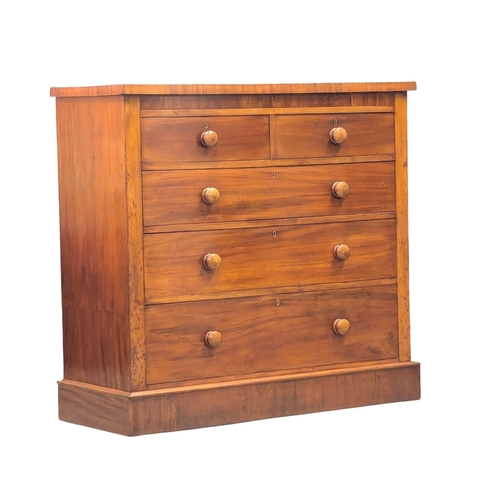 430 - A 19th Century Victorian mahogany chest of drawers with bun handles. Circa 1870/1880. 120x49x113.5cm