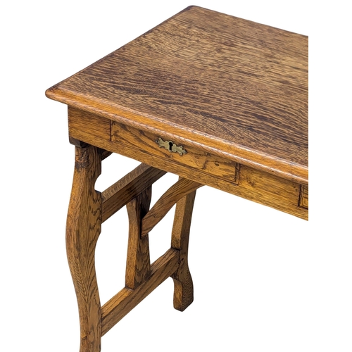 44 - An Early 20th Century oak campaign style writing desk / side table. Circa 1900. 81x45x69cm