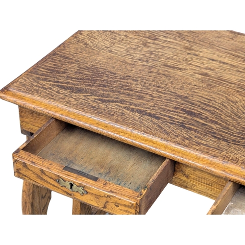 44 - An Early 20th Century oak campaign style writing desk / side table. Circa 1900. 81x45x69cm