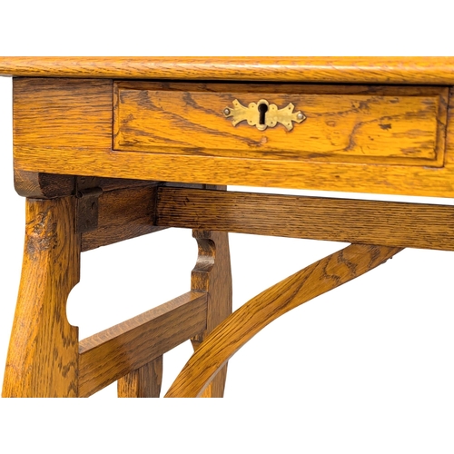 44 - An Early 20th Century oak campaign style writing desk / side table. Circa 1900. 81x45x69cm