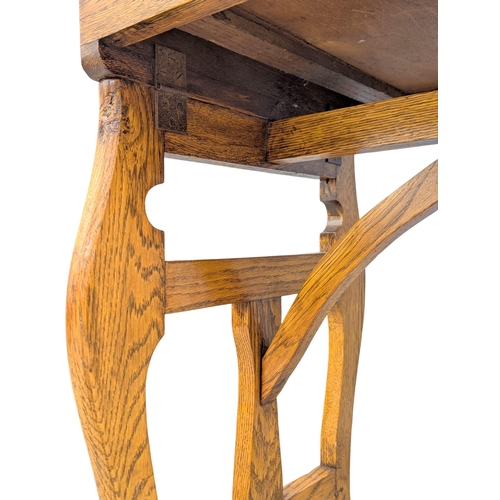 44 - An Early 20th Century oak campaign style writing desk / side table. Circa 1900. 81x45x69cm