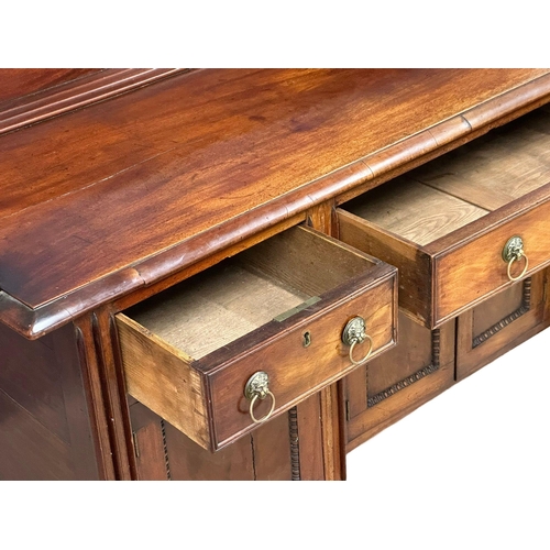 449 - An Early 19th Century, George IV mahogany gallery back sideboard. On turned wrythen legs, 3 drawers ... 