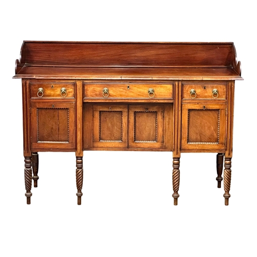 449 - An Early 19th Century, George IV mahogany gallery back sideboard. On turned wrythen legs, 3 drawers ... 