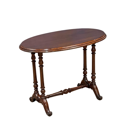 683 - A 19th Century Victorian mahogany side table with stretcher support and cabriole legs. 92x52x66.5cm