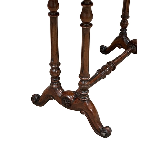 683 - A 19th Century Victorian mahogany side table with stretcher support and cabriole legs. 92x52x66.5cm