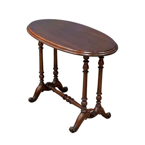 683 - A 19th Century Victorian mahogany side table with stretcher support and cabriole legs. 92x52x66.5cm