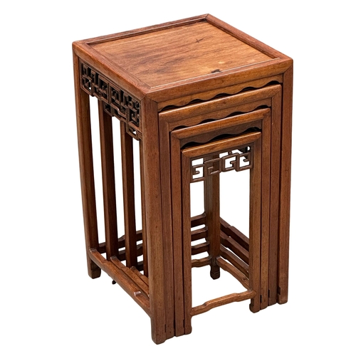 684 - A good quality Early/Mid 20th Century Chinese rosewood nest of tables. 38.5x38.5x65cm