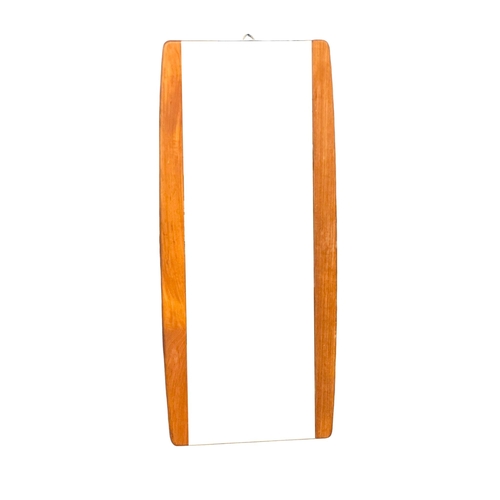 779 - A 1960’s Mid Century teak framed mirror. 35x79cm