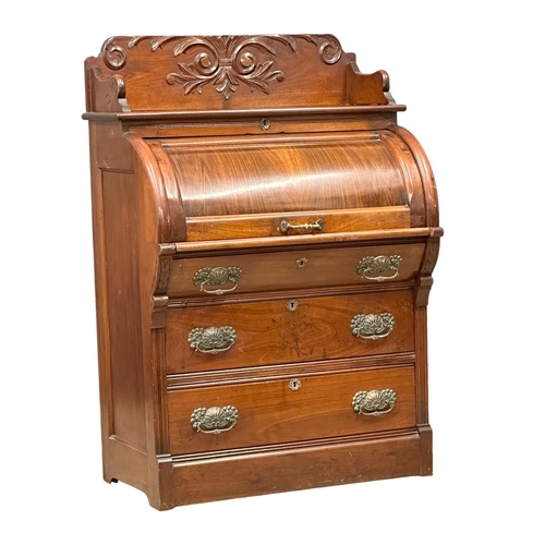 784 - A 19th Century American mahogany and walnut cylinder writing bureau. Circa 1870. 87x55x131cm