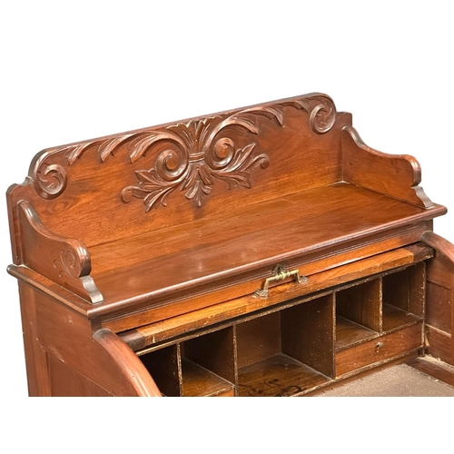 784 - A 19th Century American mahogany and walnut cylinder writing bureau. Circa 1870. 87x55x131cm