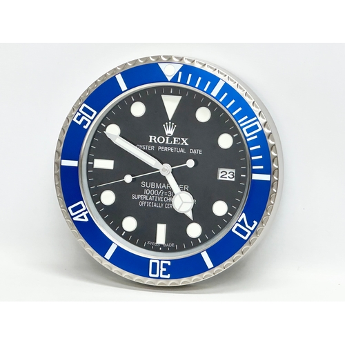 991 - A Rolex Oyster Perpetual Date Submariner advertising clock. 34cm