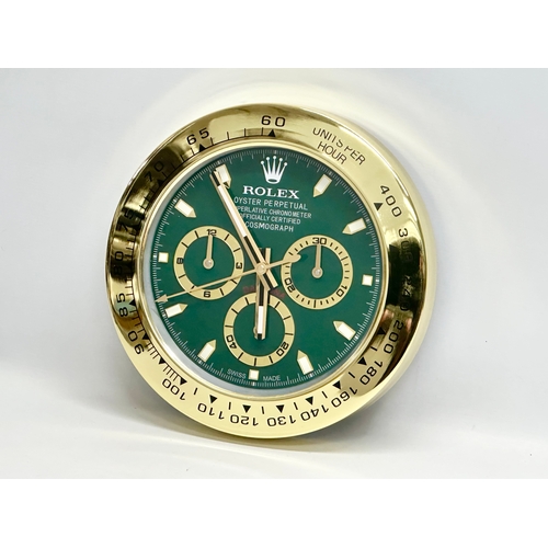 992 - A Rolex Oyster Perpetual Daytona advertising clock. 34cm