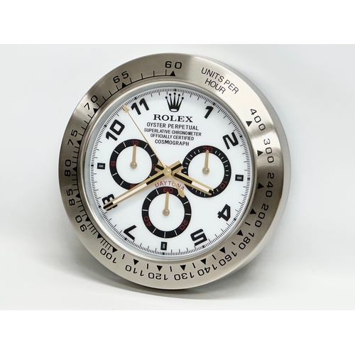 998 - A Rolex Oyster Perpetual Daytona advertising clock. 34cm