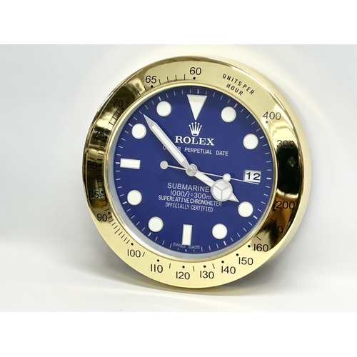 1000 - A Rolex Oyster Perpetual Date Submariner advertising clock. 34cm